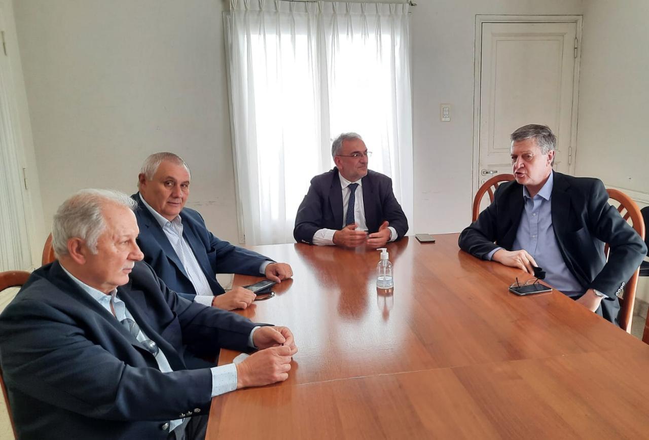 Alcides Calvo reunido con Raúl Colombetti, Enzo Olocco y Erico Ferrero
